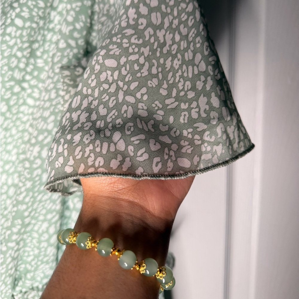 Green Patterned Dress with Ruffle Hem